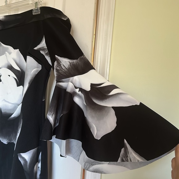 Flattering and unique shoulder showing dress - Picture 2 of 3